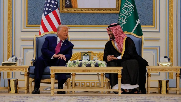 U.S. President Donald Trump and Saudi Crown Prince Mohammed Bin Salman speak as they meet in Riyadh, Saudi Arabia, May 13, 2025. REUTERS/Brian Snyder