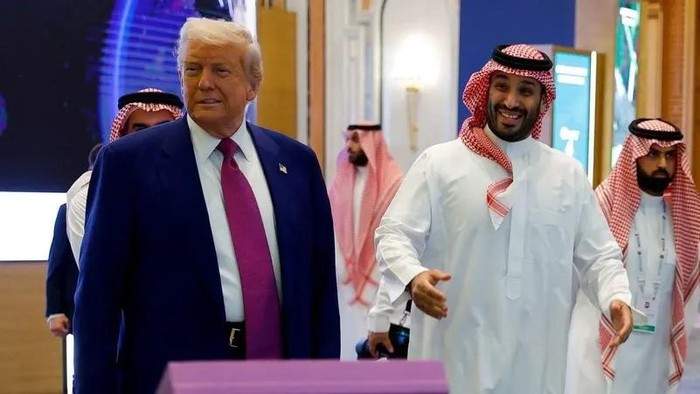 Saudi Crown Prince Mohammed bin Salman reacts next to US President Donald Trump during the US-Saudi Investment Forum, in Riyadh, Saudi Arabia, May 13, 2025. (Reuters)