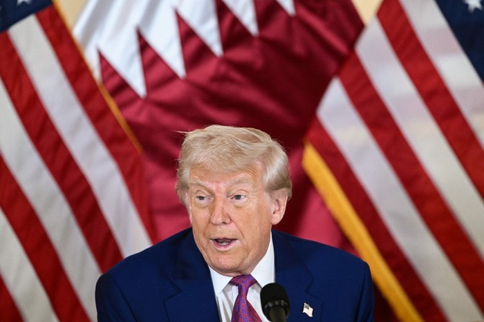 US President Donald Trump attends a breakfast with business leaders in Doha on May 15, 2025. (Photo by Brendan SMIALOWSKI / AFP)