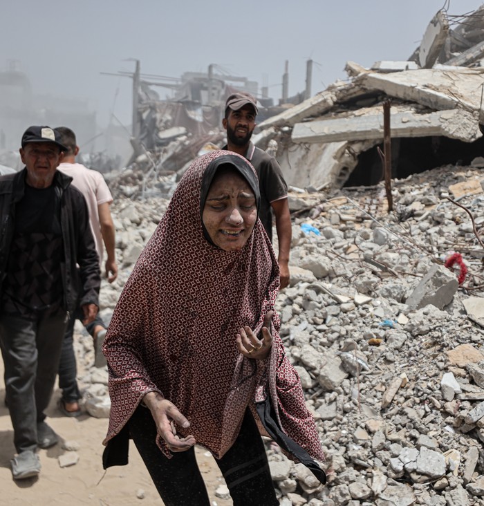 JABALIA, GAZA - MAY 17: Civil Defense teams and residents of the region carry out search and rescue operations in the area where the Israeli attack took place on the Jabalia area in the northern Gaza Strip on May 17, 2025. During the search and rescue operations, a Palestinian woman was rescued alive from under the rubble. (Photo by Abdalhkem Abu Riash/Anadolu via Getty Images)