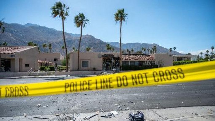 A police line is seen outside a damaged American Reproductive Centers fertility clinic after a bomb blast outside the building in Palm Springs, California, on May 17, 2025. A bomb blast outside a California fertility clinic killed one person Saturday, in what the US attorney general called an 