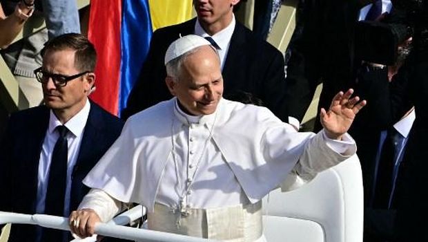 Pope Leo XIV greets the crowd from the popemobile before a Holy mass for the beginning of his pontificate, in St Peter's square in The Vatican on May 18, 2025. (Photo by Stefano Rellandini / AFP)