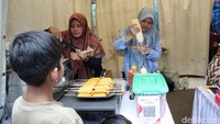UMKM Tanjung Priok tunjukkan adaptasi cepat terhadap sistem pembayaran digital lewat QRIS dalam kegiatan pameran.