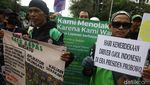 Ratusan Ojol Unjuk Rasa di Patung Kuda Jakarta