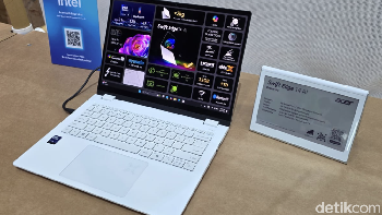 Adapun sisi menarik lain dari desainnya adalah bagian touchpad dilengkapi indikator AI Activity unik yang menyala ketika NPU digunakan atau jika Copilot diaktifkan. Mengenai fitur AI, Copilot+ PC terbaru di laptop ini memiliki NPU dengan kinerja lebih dari 40 TOPS dan menawarkan pengalaman AI seperti Recall (preview), Click to Do (preview), dan pencarian Windows yang lebih baik, Cocreator, Live Captions, dan Windows Studio Effects. Foto: Fino/detikinet