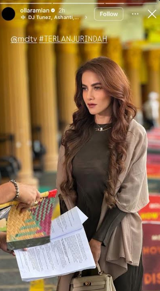 Olla Ramlan tampil perdana tanpa hijab dalam proyek sinetron terbarunya berjudul Terlanjur Indah produksi MDTV. Dalam unggahan Instagram Story, ia terlihat mengenakan kemeja dan celana panjang tanpa penutup kepala. Foto: Dok. Instagram @ollaramlan.