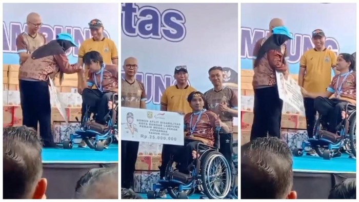 Oko Minaldi saat menerima hadiah dari Pemkot Lampung.
