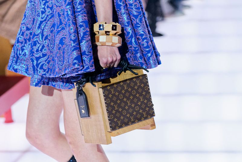 AVIGNON, FRANCE - MAY 22: A model, handbag detail, walks the runway during the Louis Vuitton Cruise 2026 at Palais Des Papes on May 22, 2025 in Avignon, France.