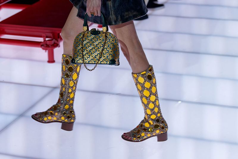AVIGNON, FRANCE - MAY 22: A model, handbag detail, walks the runway during the Louis Vuitton Cruise 2026 at Palais Des Papes on May 22, 2025 in Avignon, France.