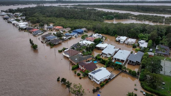 A drone view of flooding around Settlement Point Road, in Port Macquarie, New South Wales, Australia, May 22, 2025. AAP/Lindsay Moller/via REUTERS    ATTENTION EDITORS - THIS IMAGE WAS PROVIDED BY A THIRD PARTY. NO RESALES. NO ARCHIVE. AUSTRALIA OUT. NEW ZEALAND OUT. NO COMMERCIAL OR EDITORIAL SALES IN NEW ZEALAND. NO COMMERCIAL OR EDITORIAL SALES IN AUSTRALIA.     TPX IMAGES OF THE DAY