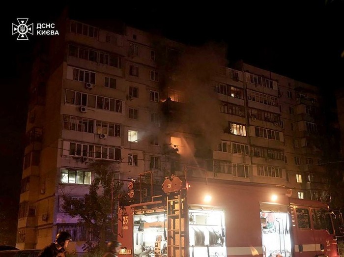 This handout photograph taken and released by the Ukrainian State Emergency Service press service on May 24, 2025, shows firefighters extinguishing a blaze in a residential building following Russian strike in Kyiv, amid Russian invasion in Ukraine. At least eight people were wounded in a drone and missile attack on Kyiv on May 24, 2025, city authorities said, just as Russia and Ukraine were in the middle of a major prisoner swap. The head of Kyivs civil and military administration, Tymur Tkachenko, reported fires and fallen debris in several parts of the Ukrainian capital, after AFP journalists heard explosions overnight. (Photo by Handout / Ukrainian State Emergency Service Press Service / AFP) / RESTRICTED TO EDITORIAL USE - MANDATORY CREDIT 