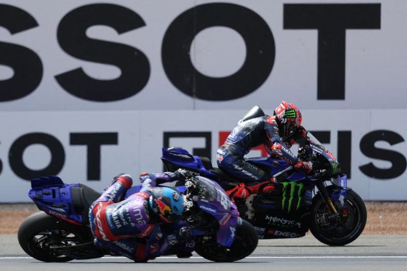 Fabio Quartararo Monster Energy Yamaha MotoGP team's French MotoGP rider Fabio Quartararo (R) exits the race after a mechanical failure during the MotoGP British Grand Prix at Silverstone circuit in Northamptonshire, central England, on May 25, 2025. (Photo by Adrian Dennis / AFP)
