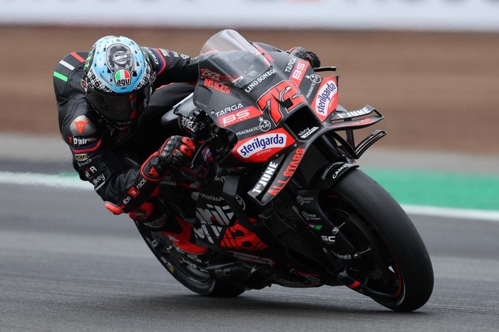 Aprilia Racing teams Italian MotoGP rider Marco Bezzecchi takes part in a practice session of the MotoGP British Grand Prix at Silverstone circuit in Northamptonshire, central England, on May 24, 2025. (Photo by Adrian Dennis / AFP)