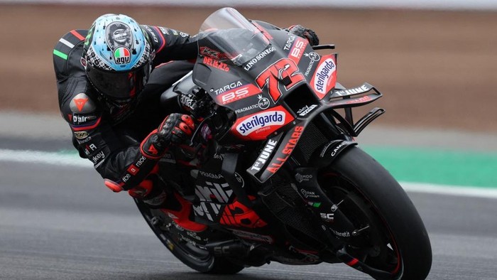 Aprilia Racing team's Italian MotoGP rider Marco Bezzecchi takes part in a practice session of the MotoGP British Grand Prix at Silverstone circuit in Northamptonshire, central England, on May 24, 2025. (Photo by Adrian Dennis / AFP)