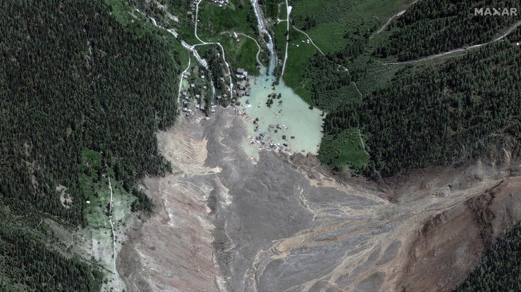 A satellite image shows the closer view of destroyed houses and blocked Ionza River, after a glacier in the Swiss Alps partially collapsed and tumbled onto the village, in Blatten, Switzerland May 29, 2025. Maxar Technologies/Handout via REUTERS  THIS IMAGE HAS BEEN SUPPLIED BY A THIRD PARTY. NO RESALES. NO ARCHIVES. MANDATORY CREDIT.  MUST NOT OBSCURE LOGO.
     TPX IMAGES OF THE DAY