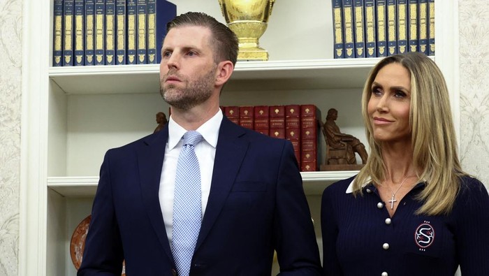 Eric Trump and Lara Trump attend a law enforcement event in the Oval Office of the White House in Washington, D.C., May 19, 2025.  REUTERS/Kevin Lamarque
