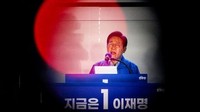 Lee kini menjadi presiden terpilih Korea Selatan. Lee menggantikan Yoon Suk Yeol yang dimakzulkan karena darurat militer yang gagal. (AFP/ANTHONY WALLACE)