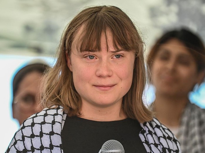 CATANIA, ITALY - JUNE 01: Greta Thunberg speaking at the press conference. Greta is part of the crew of the ship Madleen, headed to Gaza to deliver humanitarian aid on June 01, 2025 in Catania, Italy. Swedish activist Greta Thunberg is among those who will attempt to sail to Gaza on a boat organized by the Freedom Flotilla Coalition (FFC), in a bid to break Israels blockade of the Palestinian territory. Freedom Flotilla had to abort a previous journey in early May after it said its boat came under attack by drones in international waters near Malta. (Photo by Fabrizio Villa/Getty Images)
