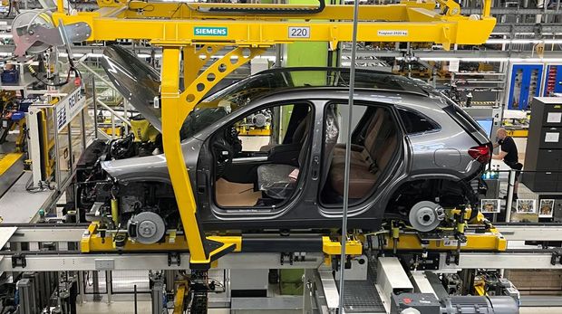 An employee of German car manufacturer Mercedes-Benz works on a Mercedes CLA class model at the production line at the factory in Rastatt, Germany, June 4, 2025.  REUTERS/Christoph Steitz