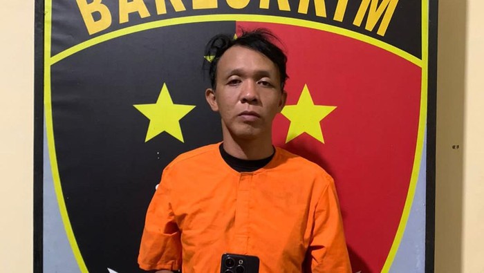 Pelaku Adit Ramadan saat diamankan petugas kepolisian.