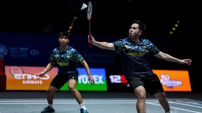 BIRMINGHAM, ENGLAND - MARCH 14: Sabar Karyaman Gutama (L) and Moh Reza Pahlevi Isfahani of Indonesia compete in the Mens Doubles Quarter Finals match against Yang Po Han and Liu Kuang Heng of Chinese Taipei on day four of the Yonex All England Open Badminton Championships at Utilita Arena Birmingham on March 14, 2025 in Birmingham, England. (Photo by Shi Tang/Getty Images)