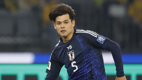 PERTH, AUSTRALIA - JUNE 05: Kaishu Sano of Japan passes the ball away during the 2026 FIFA World Cup Round Three AFC Asian Qualifier match between Australia Socceroos and Japan at Optus Stadium on June 05, 2025 in Perth, Australia. (Photo by James Worsfold/Getty Images)