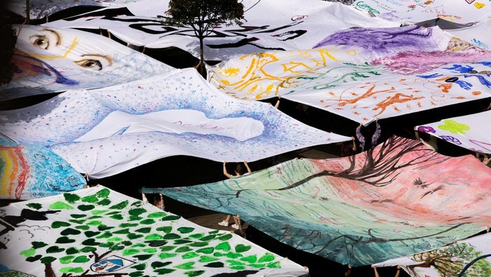 The square of Premysl Otakar II is covered by a giant painting, prepared by people from various city associations, communities, schools, institutions and organisations, which was created by composing 92 canvases of eight by eight metres, in Ceske Budejovice, Czech Republic, June 6, 2025. The event is part of the cultural festivities of SOUTOK - celebration of the 760th anniversary of the city of Ceske Budejovice. REUTERS/Eva Korinkova