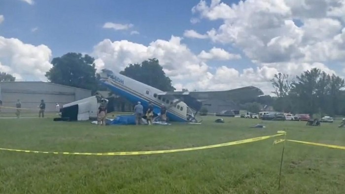 This handout screengrab courtesy of the X account of Tennessee Highway Patrol shows troopers and police cars at the scene of a plane crash on Old Shelbyville Road in Tullahoma, Tennessee on June 8, 2025. A plane carrying 20 people crashed in the US state of Tennessee on June 8, with some on board taken to hospital for injuries, according to state and federal officials.
The Tennessee Highway Patrol said on X that its troopers were assisting police 