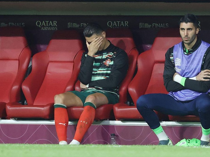 MUNICH, GERMANY - JUNE 8:  Cristiano Ronaldo of Portugal looks disappointed & dejected with his head in his hands after being substituted off the pitch injured during the UEFA Nations League 2025 final match between Portugal and Spain at Munich Football Arena on June 8, 2025 in Munich, Germany. (Photo by Crystal Pix/MB Media/Getty Images)