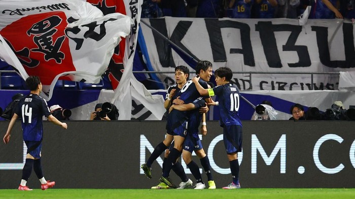 Timnas Jepang kembali membobol gawang Timnas Indonesia. Samurai Biru kini sudah mencetak setengah lusin gol alias enam gol ke gawang Garuda. Pertandingan berlangsung di Suita City Stadium, Selasa (10/6/2025).