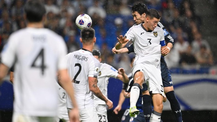 SUITA, JAPAN - JUNE 10: Daichi Kamada of Japan (C) celebrates after scoring the teams first goal during the FIFA World Cup Asian Third Qualifier Group C match between Japan and Indonesia at Panasonic Stadium Suita on June 10, 2025 in Suita, Osaka, Japan. (Photo by Kenta Harada/Getty Images)