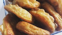 Menu sarapan khas Libya, sfinz berada di posisi ke-3. Pastry goreng ini dibentuk seperti bola-bola kecil kemudian dinikmati bersama madu. Foto: TasteAtlas