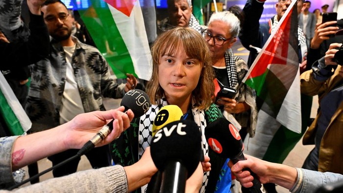 Swedish activist Greta Thunberg talks to journalists as she arrives at Arlanda airport outside Stockholm, Sweden, June 10, 2025. TT News Agency/Anders Wiklund via REUTERS      ATTENTION EDITORS - THIS IMAGE WAS PROVIDED BY A THIRD PARTY. SWEDEN OUT. NO COMMERCIAL OR EDITORIAL SALES IN SWEDEN.