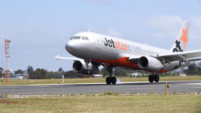 A Jetstar aircraft lands at Sydney Airport on November 09, 2021 in Sydney, Australia.