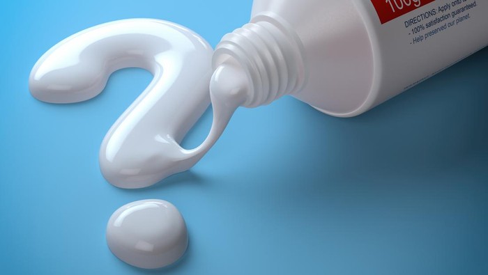 Toothpaste in the shape of question mark coming out from toothpaste tube. Brushing teeth dental concept. 3d illustration