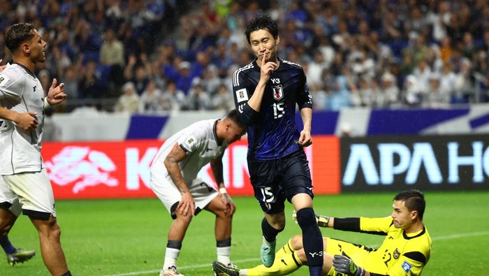 Soccer Football - World Cup - AFC Qualifiers - Group C - Japan v Indonesia - Suita City Stadium, Suita, Japan - June 10, 2025 Japans Daichi Kamada celebrates scoring their third goal REUTERS/Issei Kato