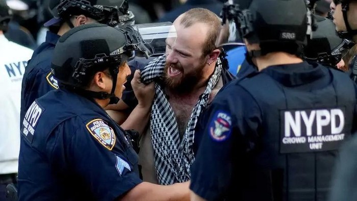 Law enforcement officers detain a demonstrator during a protest against federal immigration sweeps near the U.S. immigration court at the Jacob K. Javits Federal Building in New York City, U.S., June 10, 2025. (Reuters)