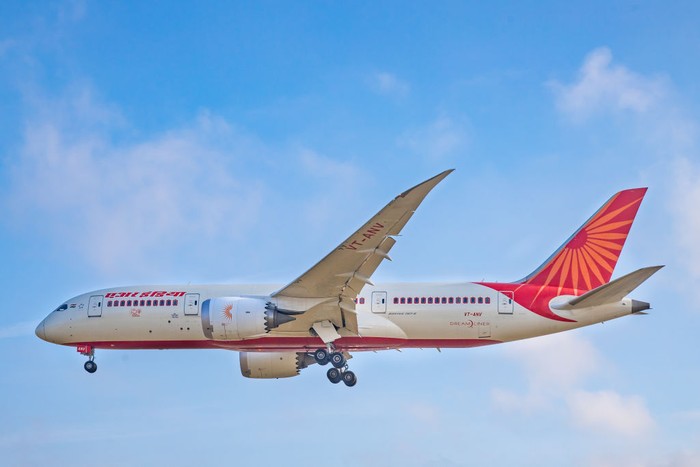 Air India Boeing 787-8 Dreamliner airplane as seen on final approach landing at London Heathrow International Airport LHR EGLL in England, UK. The long haul wide-body Boeing 787 aircraft has the registration VT-ANV, 2x GE jet engines. AirIndia AI AIC is the flag carrier of India and government-owned. The Indian airline carrier is a Star Alliance aviation alliance member and connects the British capital to Ahmedabad, Bengaluru, Delhi and Mumbai. (Photo by Nicolas Economou/NurPhoto via Getty Images)