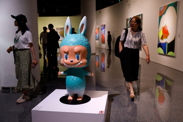 A human-sized Labubu figurine is displayed before an auction in Beijing, China June 6, 2025. The figurine was later sold for 1.08 million yuan at an auction by Yongle International Auction on Tuesday. REUTERS/Tingshu Wang