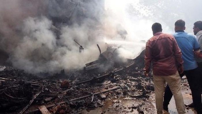 This handout taken and posted on the X (formerly Twitter) account of the Central Industrial Security Force (CISF) On June 12, 2025 shows the back of AN Air India plane after it crashed in a residential area near the airport in Ahmedabad. The London-bound Air India flight 171 passenger plane crashed on June 12 in Indias western city of Ahmedabad with 242 on board, aviation officials said in what the airline called a 
