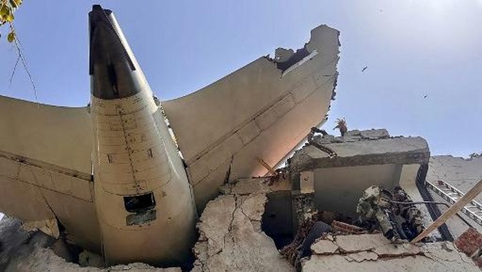 This handout taken and posted on the X (formerly Twitter) account of the Central Industrial Security Force (CISF) On June 12, 2025 shows the back of AN Air India plane after it crashed in a residential area near the airport in Ahmedabad. The London-bound Air India flight 171 passenger plane crashed on June 12 in Indias western city of Ahmedabad with 242 on board, aviation officials said in what the airline called a 