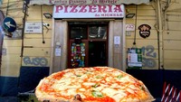 Antica Pizzeria da Michele di Naples mulai beroperasi tahun 1870. Popularitasnya makin mendunia berkat pizza Neapolitan yang autentik. Foto: Site Culinary/Visual