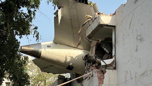 Wreckage of a Boeing 787 Dreamliner lies at the site, showing part of its registration VT-ANB, where the Air India plane crashed in Ahmedabad, India, June 12, 2025. REUTERS/Amit Dave     TPX IMAGES OF THE DAY