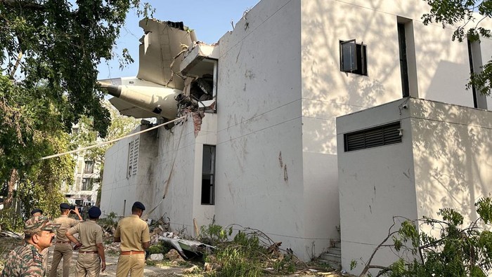 Wreckage of a Boeing 787 Dreamliner lies at the site, showing part of its registration VT-ANB, where the Air India plane crashed in Ahmedabad, India, June 12, 2025. REUTERS/Amit Dave     TPX IMAGES OF THE DAY