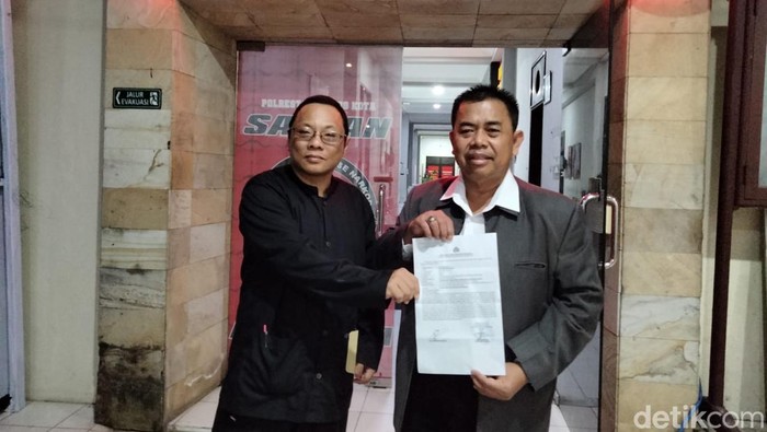 Pengurus Yayasan Sosial Panca Budhi saat laporan di Polresta Malang Kota