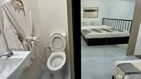 Di ruangan yang sama ada kamar mandi berisi shower, wastafel, dan WC duduk.