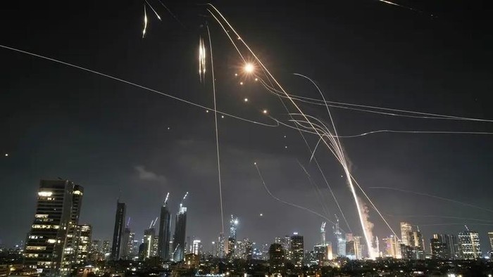 Israeli Iron Dome air defense system fires to intercept missiles over Tel Aviv, Israel, June 13, 2025. (AP)