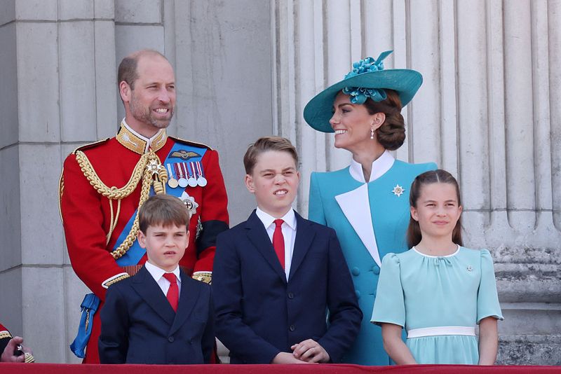 LONDON, ENGLAND - JUNE 14:  Prince Louis of Wales, Prince William, Prince of Wales, Prince George of Wales, Catherine, Princess of Wales and Princess Charlotte of Wales wave from the balcony at Buckingham Palace during Trooping The Colour 2025 on June 14, 2025 in London, England. Trooping The Colour is a ceremonial parade celebrating the official birthday of the British Monarch. The event features over 1,400 soldiers and officers, accompanied by 200 horses. More than 400 musicians from ten different bands and Corps of Drums march and while performing. (Photo by Neil Mockford/Getty Images)