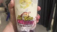 Terkenal sebagai pusat jajanan kaki lima, di Duren Sawit ada es teler creamy seharga mulai Rp 10.000an. Nama kedainya Es Teler Creamy Shasa yang berlokasi di Jalan Kp. Sumur Utara No.19, Duren Sawit, Jakarta Timur. Foto: Google Review