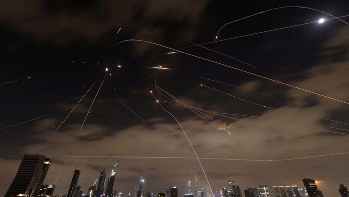 Missiles launched from Iran are intercepted as seen from Tel Aviv, Israel, June 16, 2025. REUTERS/Ronen Zvulun     TPX IMAGES OF THE DAY